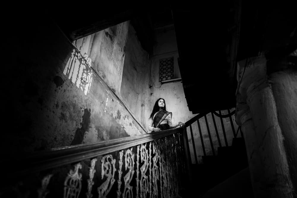 Elegant Woman On Stairs by Kuntal Biswas — canvas wall art