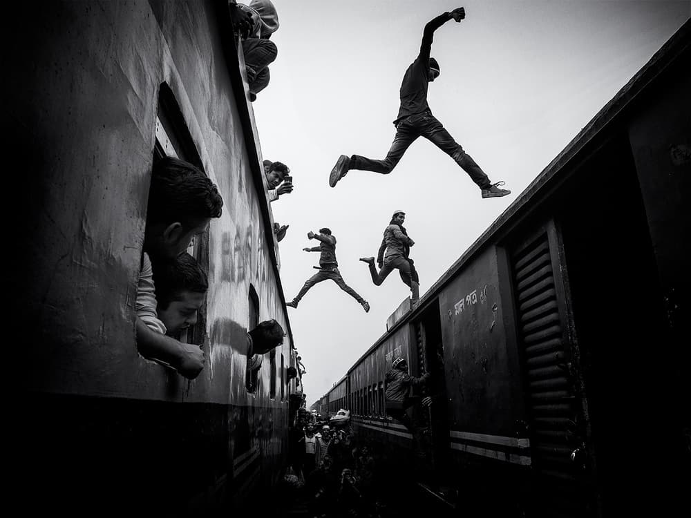 People Jumping Trains by Marcel Rebro — canvas wall art