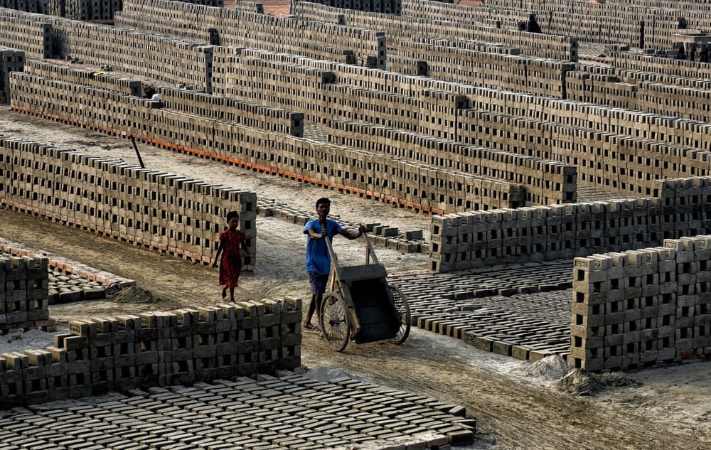 Young Brick Workers by Avishek Das — canvas wall art