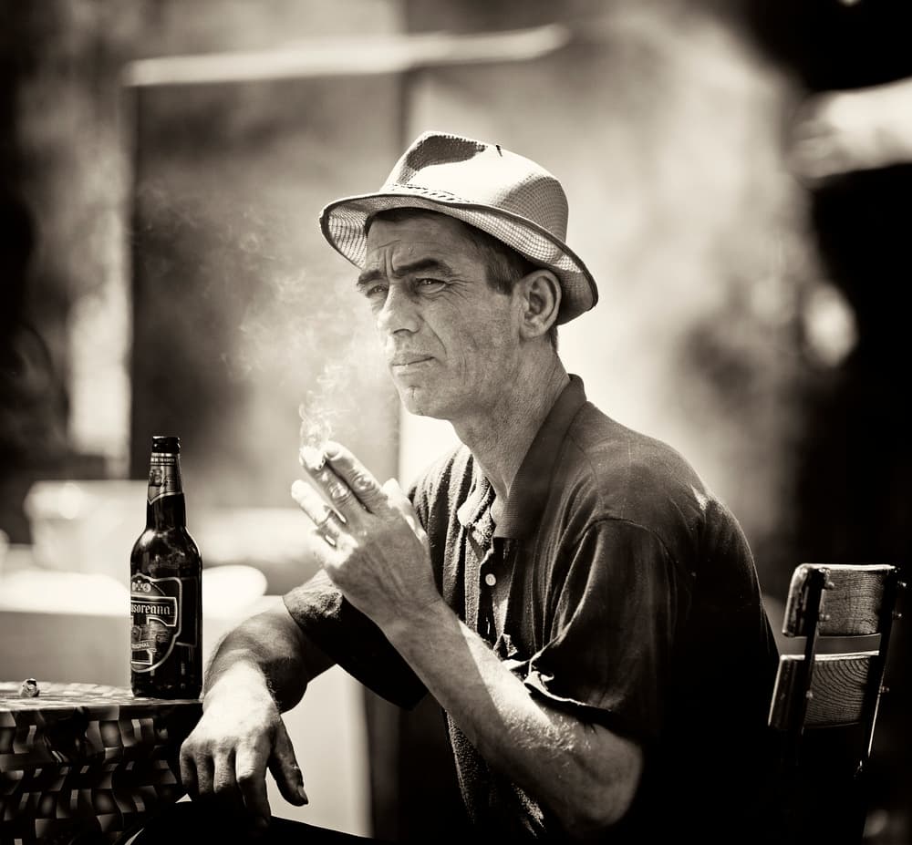 Thoughtful Man Smoking by Julien Oncete — canvas wall art