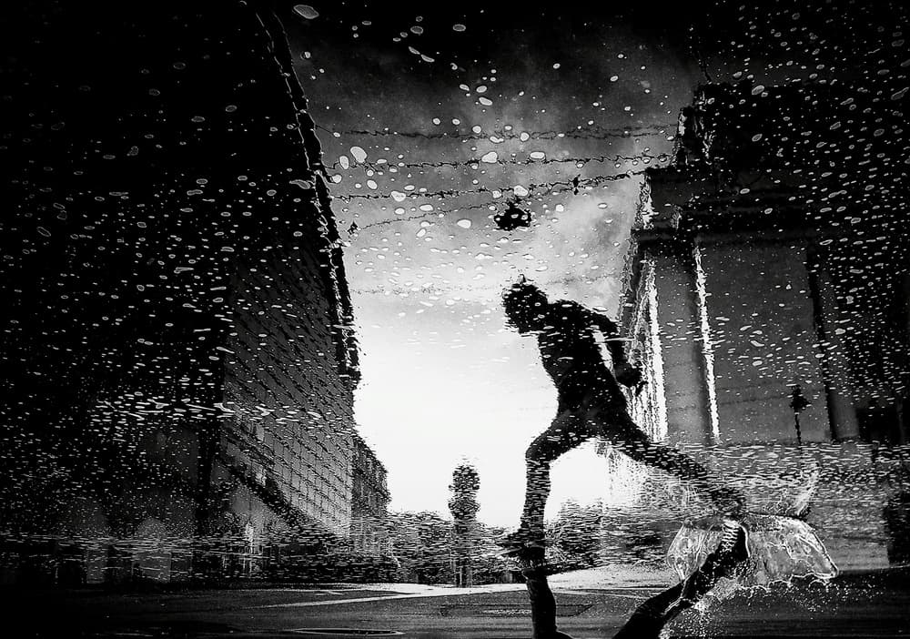 Running Man Reflection by Mirela Momanu — canvas wall art