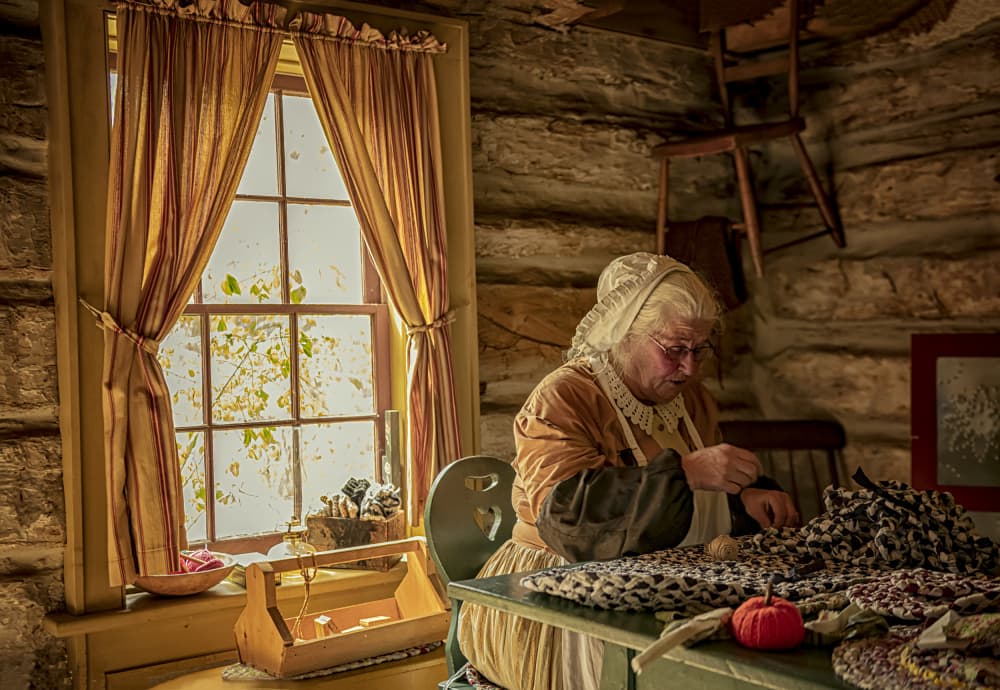 Woman Crafting in Cabin by Betty Liu — canvas wall art