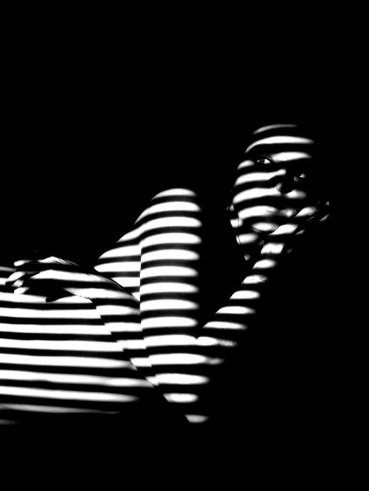 Woman in Striped Light by Ruslan Kolodenskiy — canvas wall art