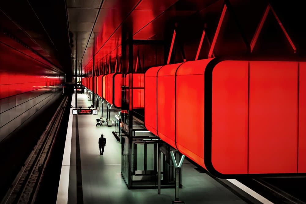 Red Lit Subway Station by Anita Martin AnnaPileaFotografie — canvas wall art