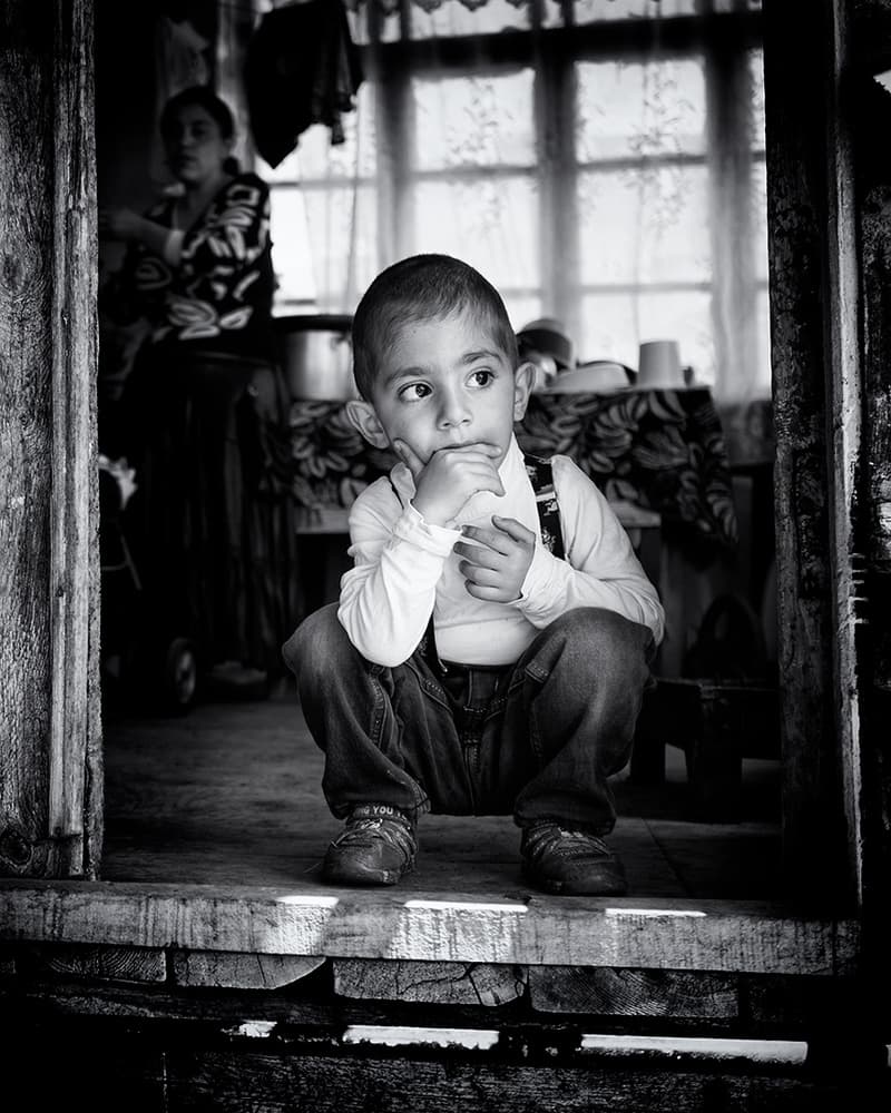 Child's Thoughtful Gaze by Marcel Rebro — canvas wall art