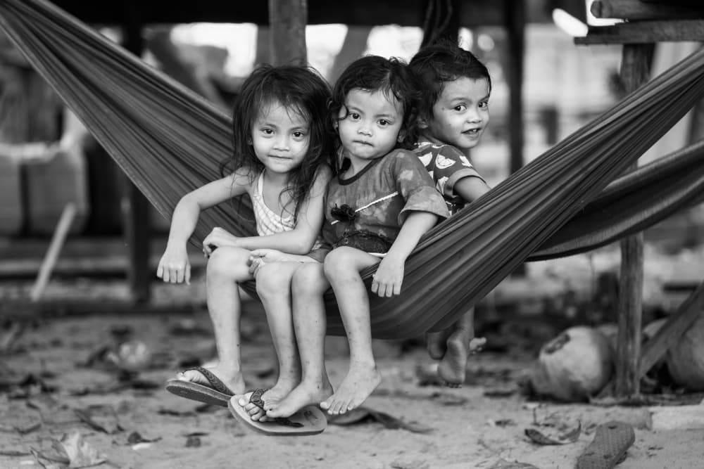 Young Faces in Hammock by Songlin Xu — canvas wall art