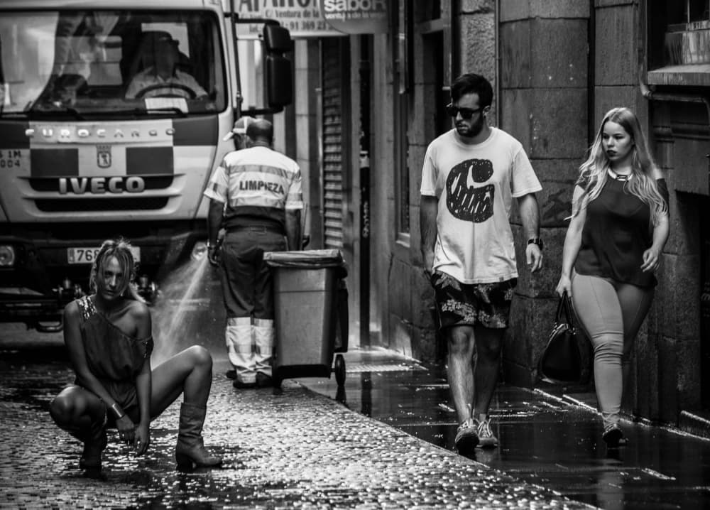 Wet Street Life by Alejandro Marcos — canvas wall art