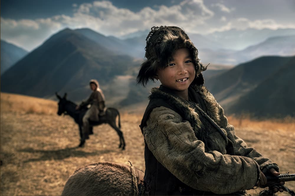 Mountain Child Smile by Waldemar Szmidt — canvas wall art