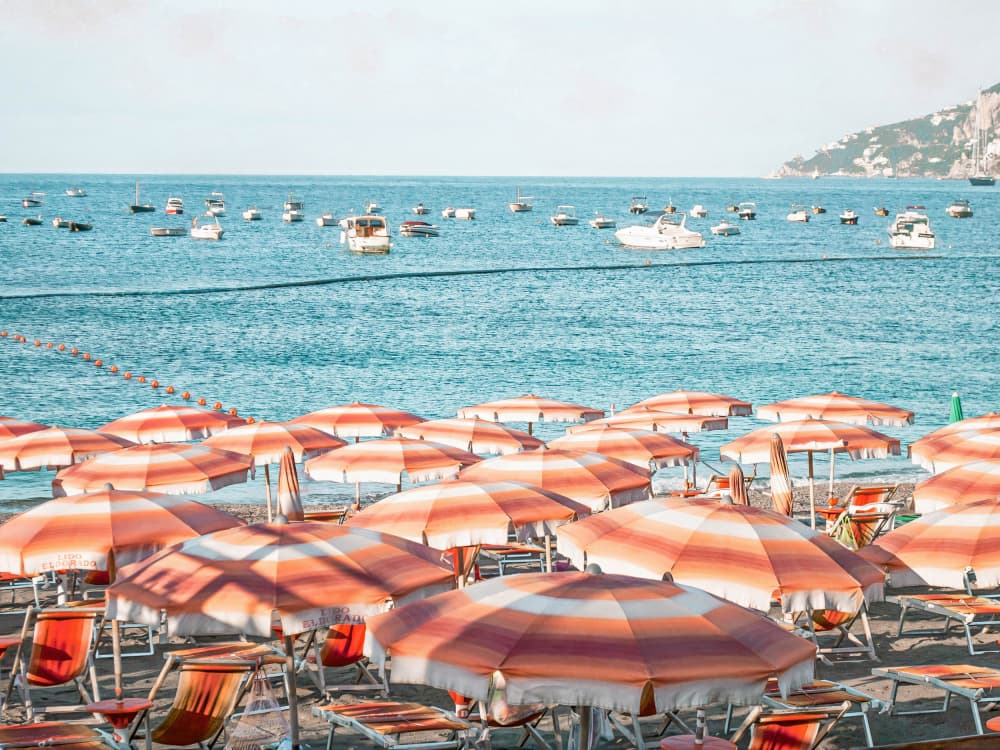Sunny Beach Umbrellas by Talitha McQueen — canvas wall art
