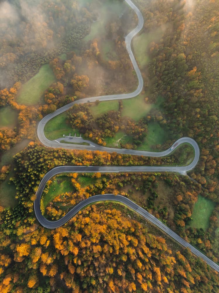 Winding Autumn Road by Jure Kravanja — canvas wall art