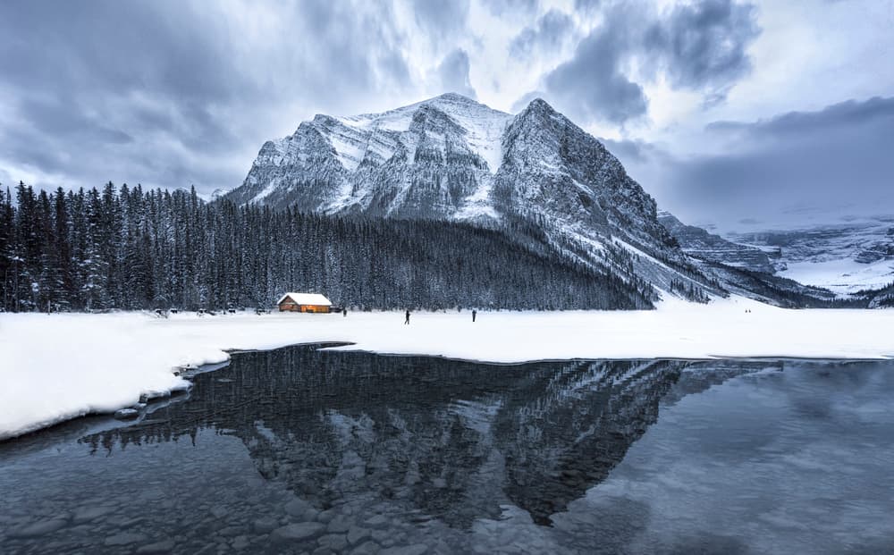 Snowy Mountain Cabin Reflection by Larry Deng APA — canvas wall art