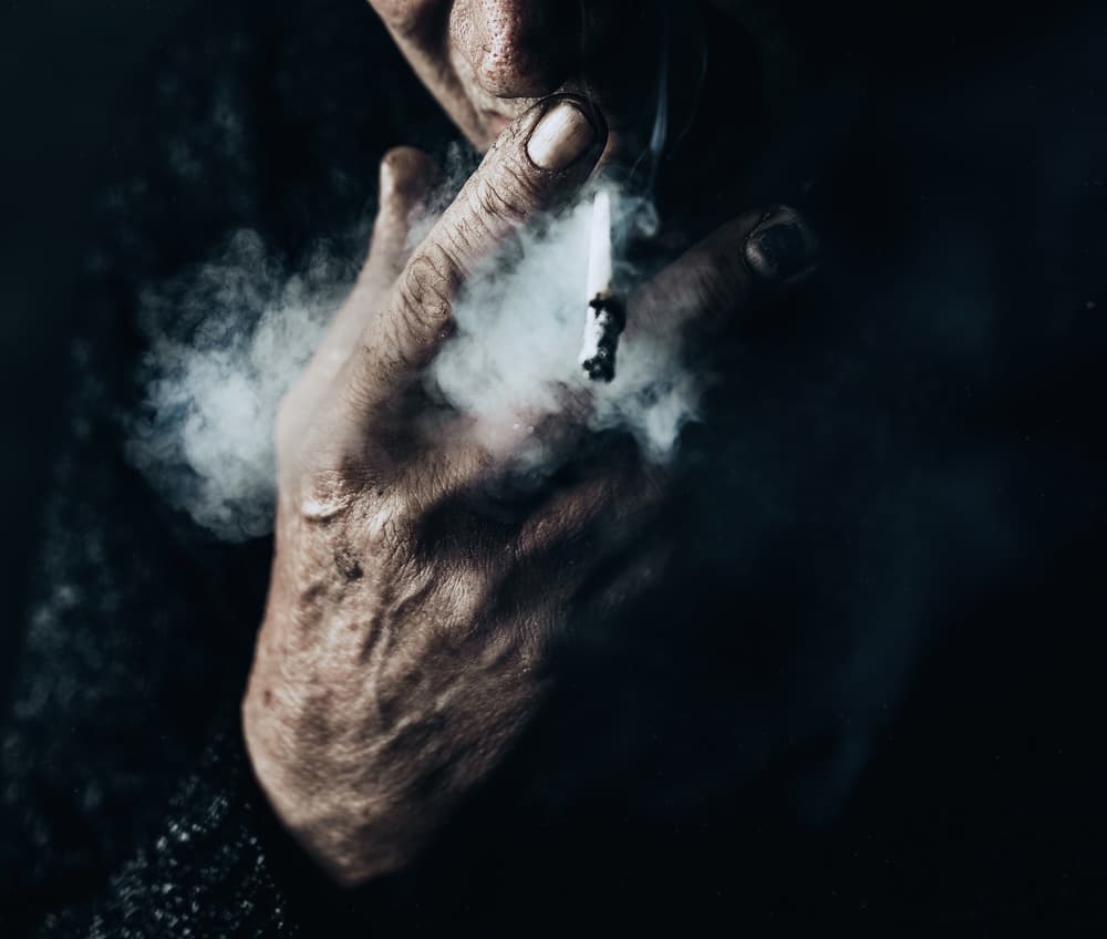 Aged Hand Smoking by Koki Jovanovic — canvas wall art