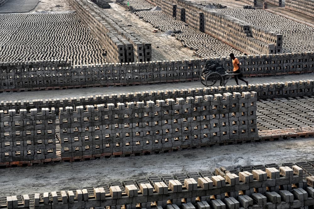 Worker in Brickyard by Avishek Das — canvas wall art