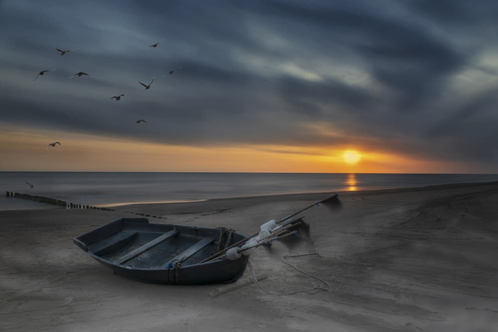 Old Boat Golden Sunset by Normunds Kaprano — canvas wall art