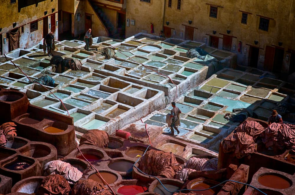 Fes Tannery Workers by Angela Muliani Hartojo — canvas wall art