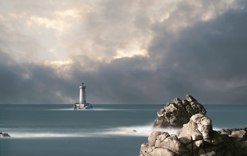 Lighthouse Under Dramatic Skies by Fred Louwen — canvas wall art