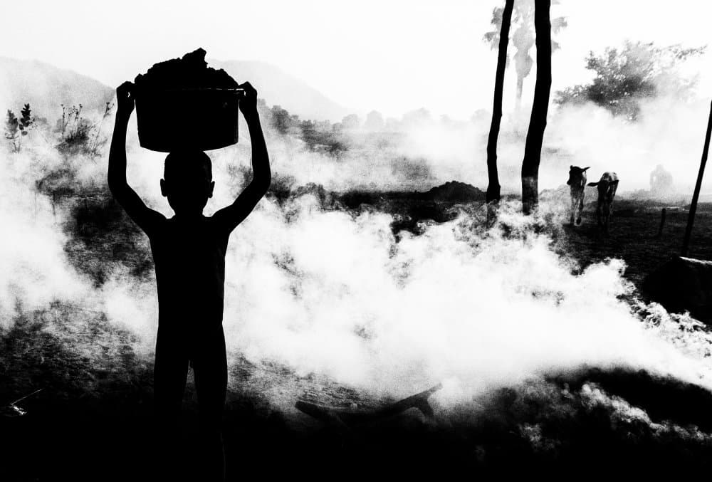 Child In Smoky Landscape by Joxe Inazio Kuesta Garmendia — canvas wall art