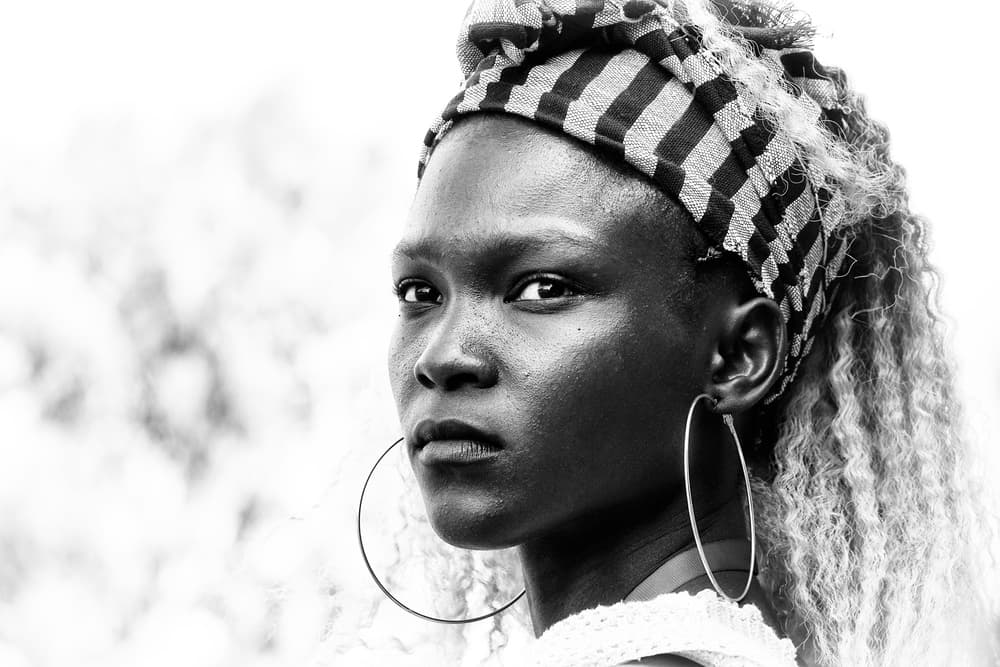 African Woman Headwrap Portrait by Elena Molina — canvas wall art