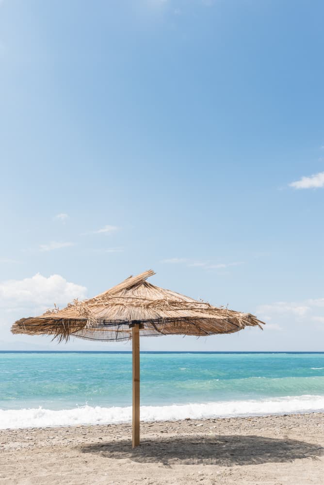 Sunny Beach Umbrella by Photolovers — canvas wall art