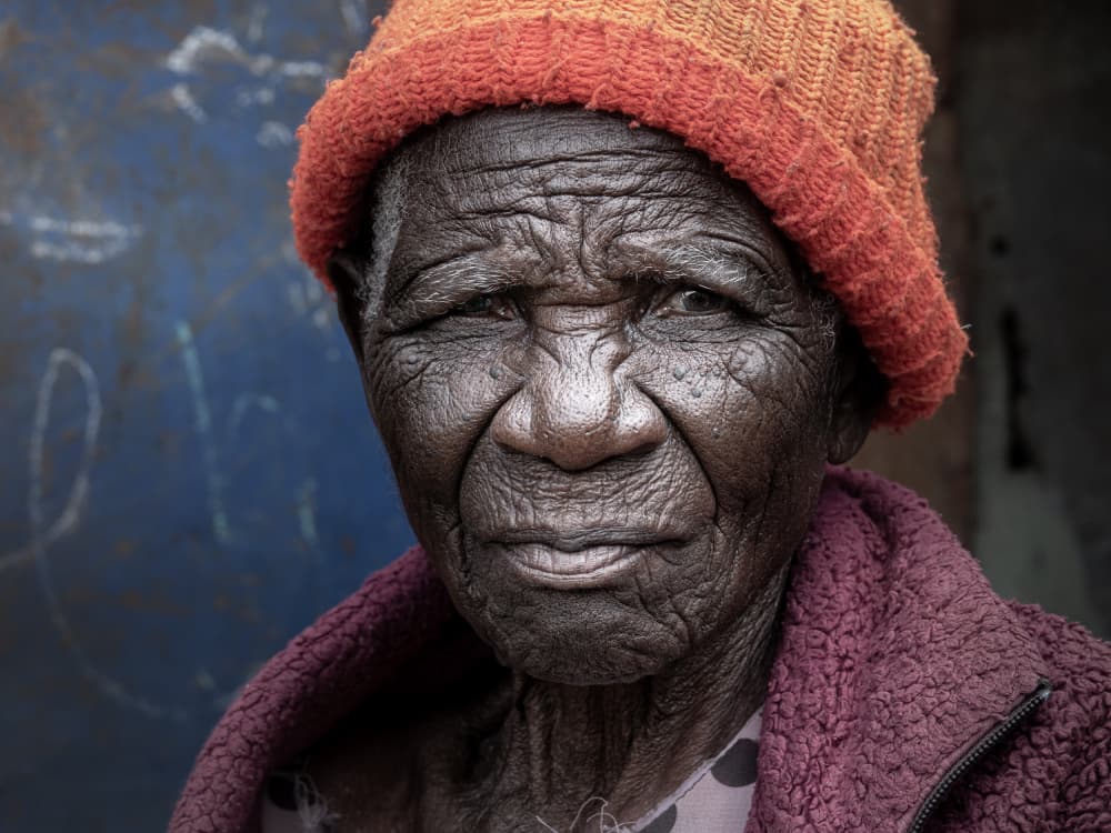Elderly Woman Portrait by Elena Molina — canvas wall art