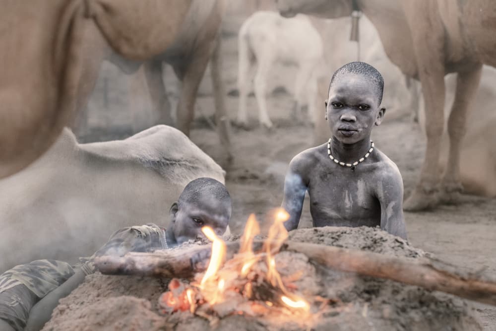 African Boys by Fire by Trevor Cole — canvas wall art