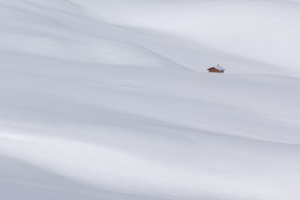Isolated Snow Cabin by Uschi Hermann — canvas wall art