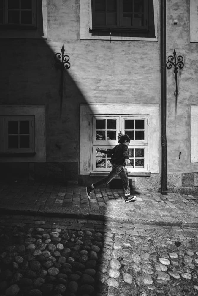 Running Through Shadow by Alex Ogazzi — canvas wall art