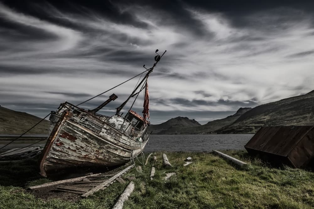 Weathered Fjord Fishing Boat by Bragi Ingibergsson - BRIN — canvas wall art