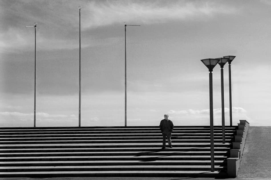 Man on Grand Stairs by Jure Kravanja — canvas wall art