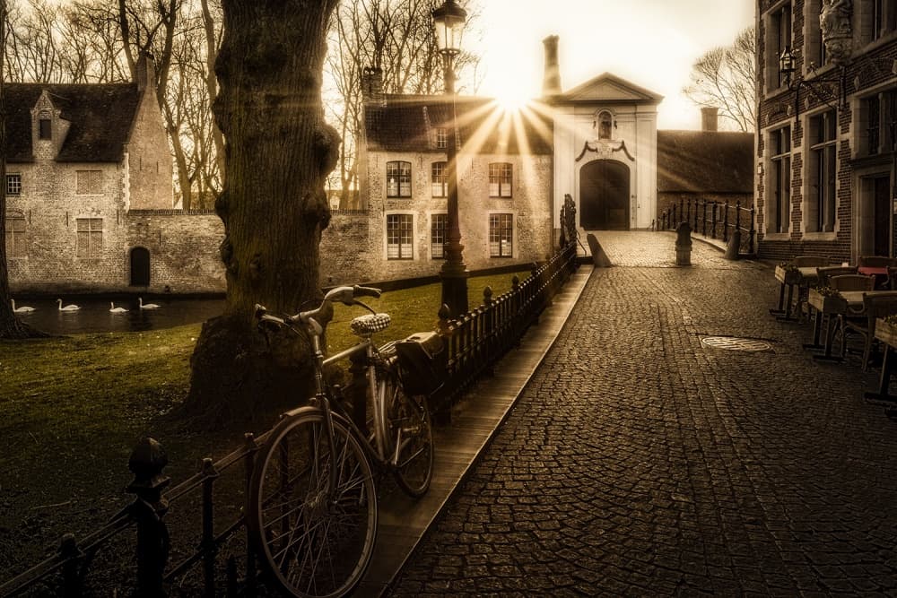 Sunlit Canal Path Bicycles by Adrian Popan — canvas wall art