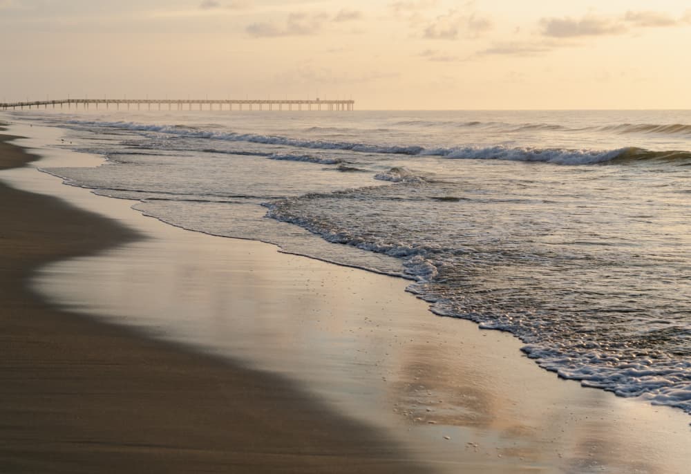 Coastal Pier Sunrise by Courtney Crane — canvas wall art