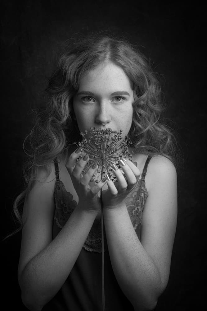 Pensive Woman with Allium by Ruth Franke — canvas wall art