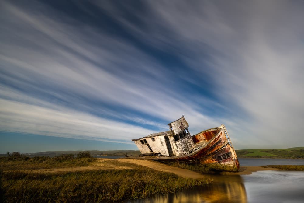 Weathered Boat Sky by Sophia Li — canvas wall art