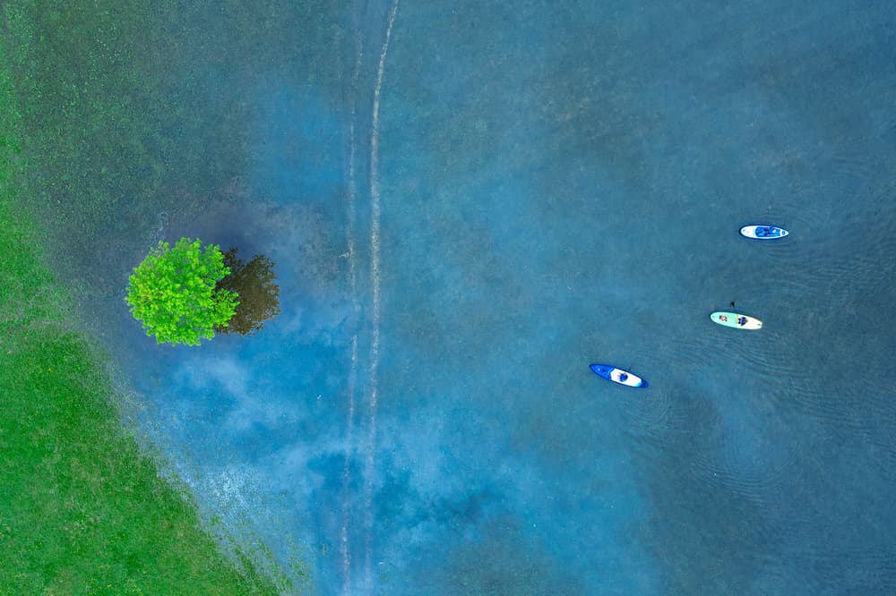Aerial Paddleboard Scene by Jure Kravanja — canvas wall art