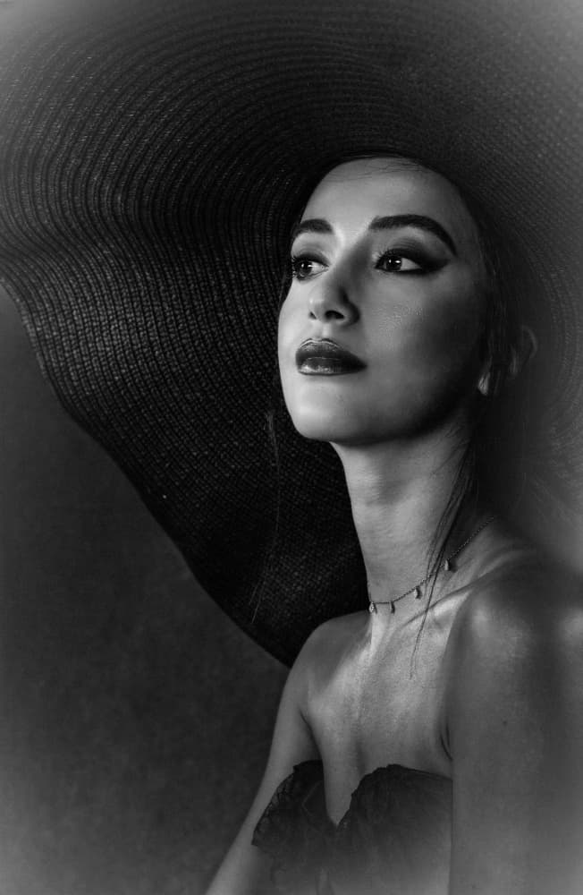 Elegant Woman in Hat by Sharon Levy — canvas wall art