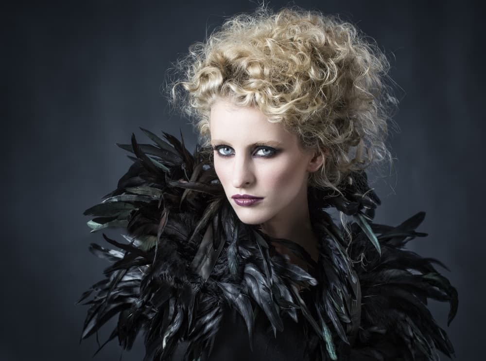 Mysterious Feathered Portrait by Catchlight Studio — canvas wall art