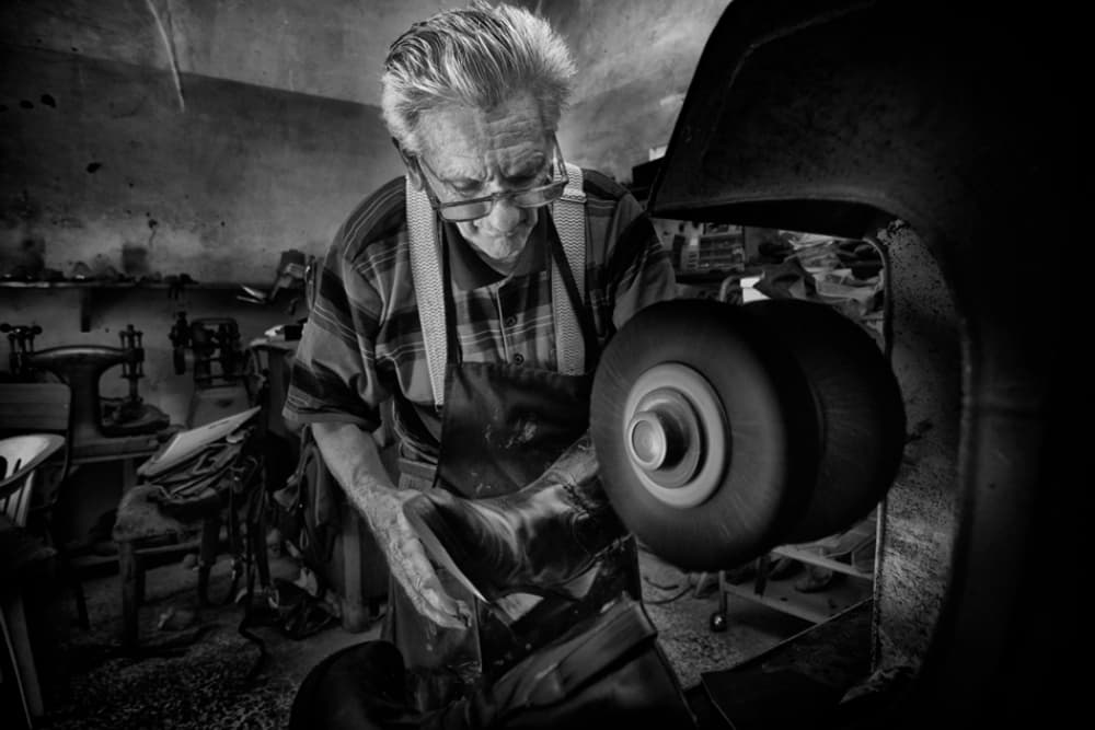 Old Shoemaker Working by Antonio Grambone — canvas wall art