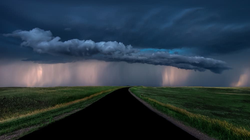 Stormy Country Road by Jun Zuo — canvas wall art
