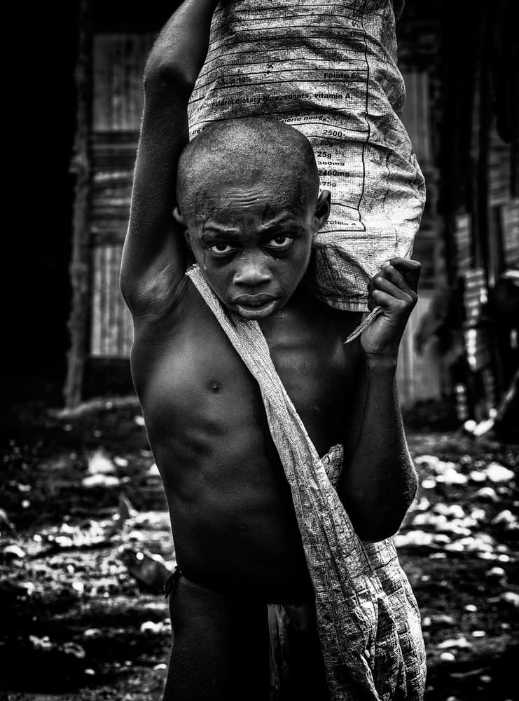Serious Boy's Gaze by Joxe Inazio Kuesta Garmendia — canvas wall art