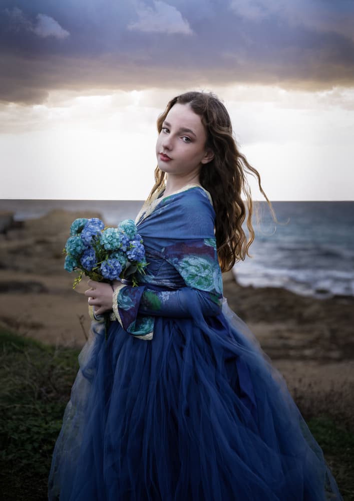Girl in Blue by Sea by Sharon Levy — canvas wall art