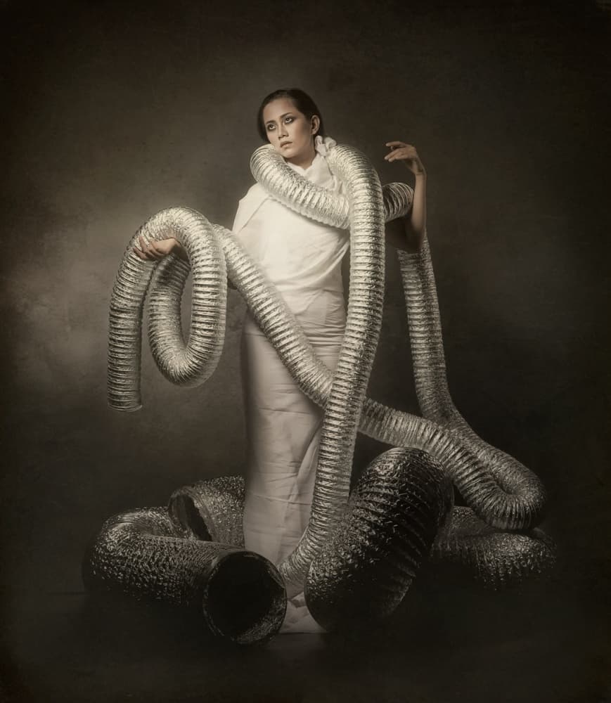 Pensive Woman Metallic Ducts by Hari Sulistiawan — canvas wall art