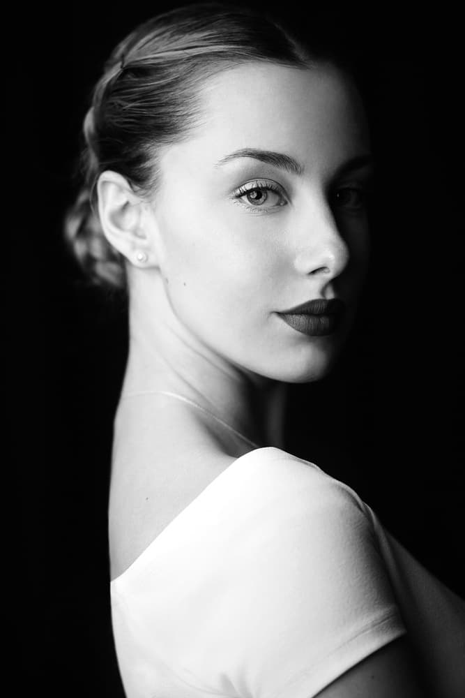 Elegant Woman Gaze by Bobby Kostadinov — canvas wall art