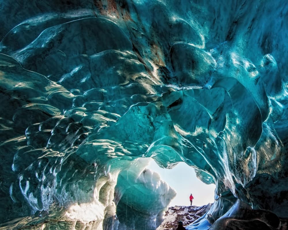 Blue Ice Cave Entrance by Andrew J. Lee — canvas wall art