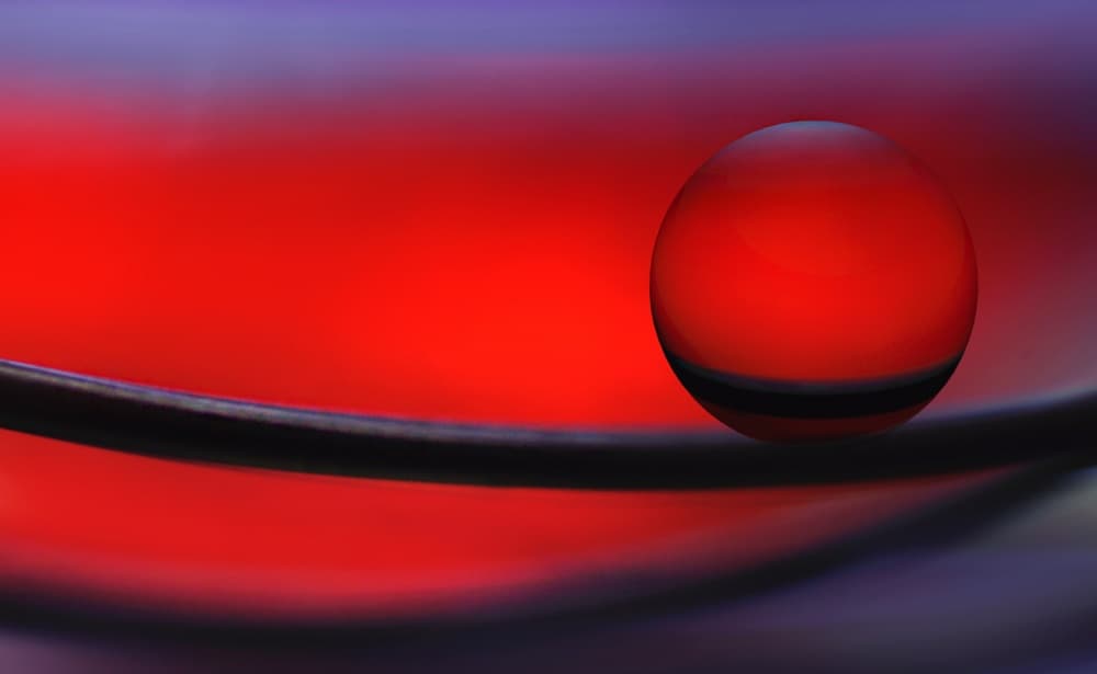 Vibrant Red Orb by Jutta Kerber — canvas wall art
