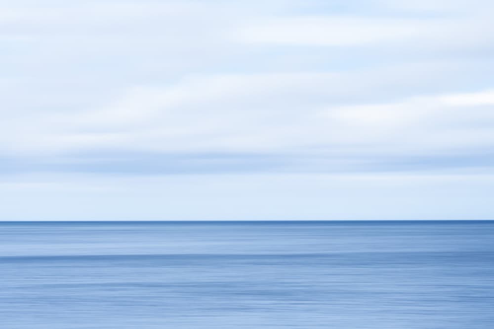 Calm Blue Ocean by Christa Stroo — canvas wall art