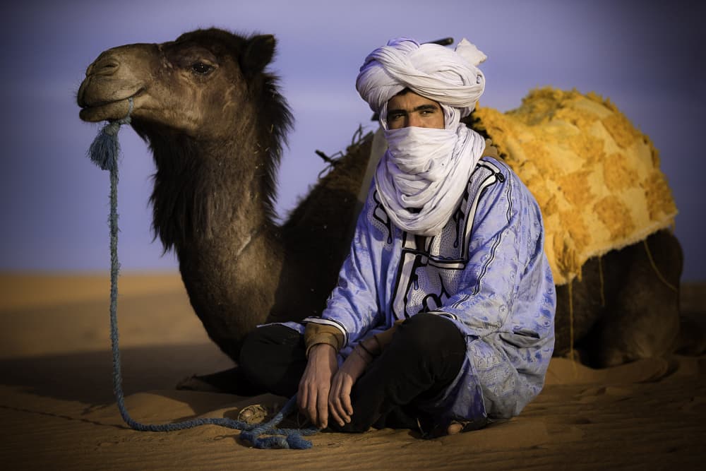 Desert Man with Camel by Moris Raskin — canvas wall art