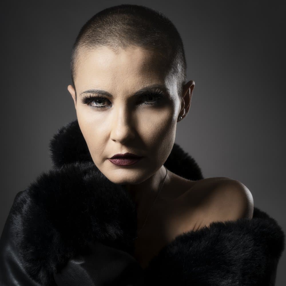 Bold Shaved Head Gaze by Marina Anghileri — canvas wall art