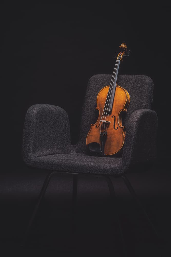 Elegant Violin on Chair by Dariusz Budyta — canvas wall art