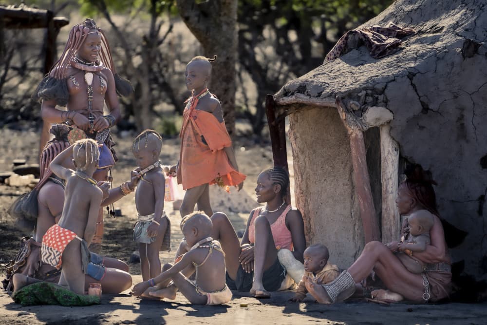 Himba Village Life by Eyal Alcalay — canvas wall art