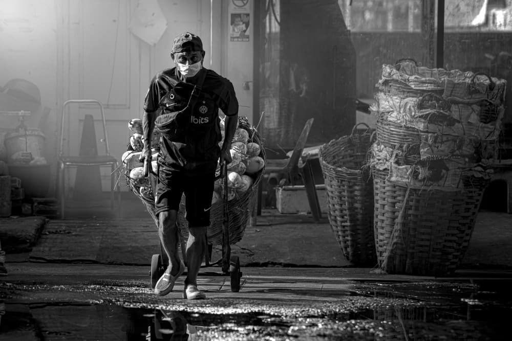Market Man's Daily Push by Anuchit Sundarakiti — canvas wall art